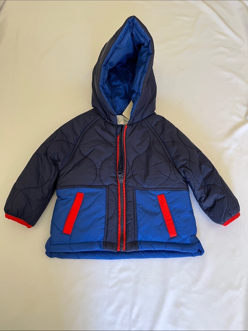Toddler Hooded Two-Tone Navy and Royal Blue Puffer Jacket with Red Accents